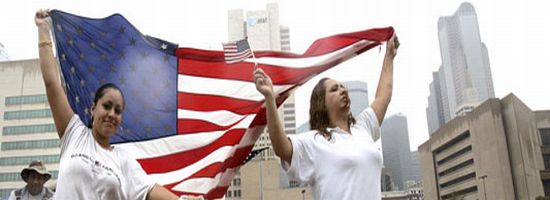 girls waving US flag