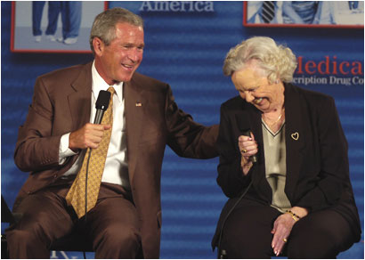 Bush laughing with senior citizen