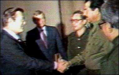 Rumsfeld shakes hands with Saddam
